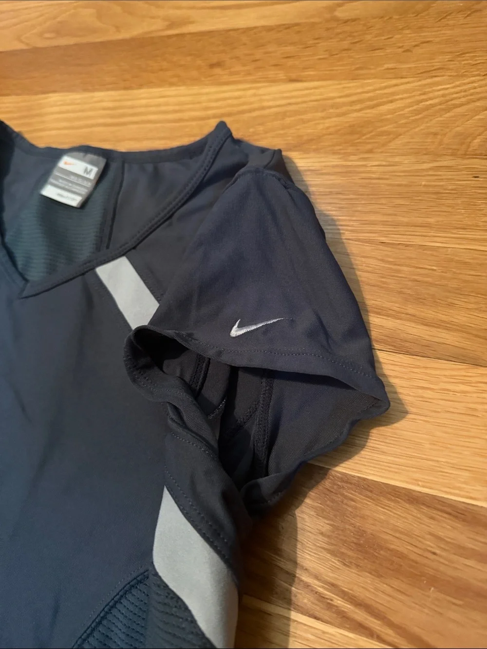 Nike Women’s Dark Gray Short-Sleeve V-Neck Athletic Tee with light gray Accents
